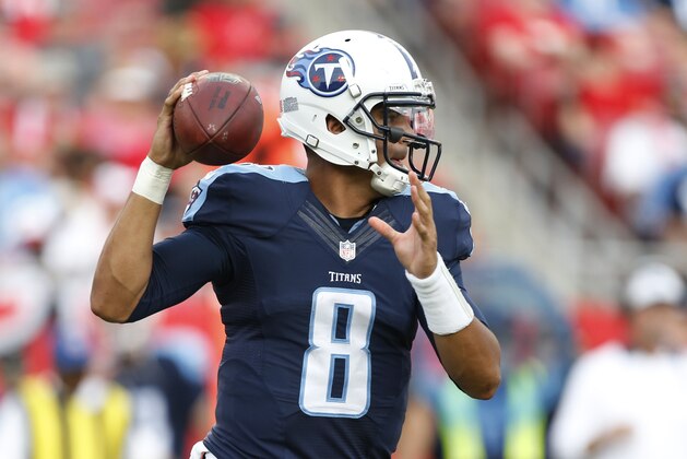 Tennessee Titans quarterback Marcus Mariota (8) looks to pass during the second half of an NFL football game against the Tampa Bay Buccaneers, Sunday, Sept. 13, 2015, in Tampa, Fla. (AP Photo/Brian Blanco)