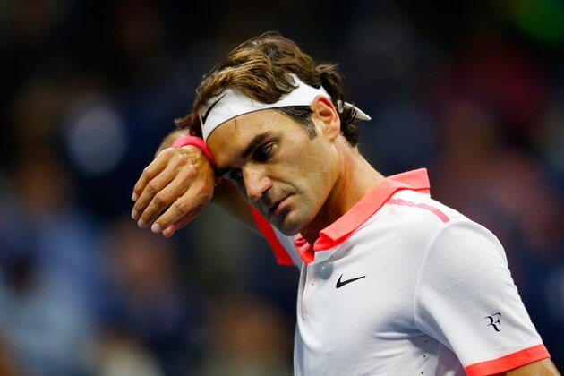NEW YORK, NY - SEPTEMBER 13:  Roger Federer of Switzerland reacts against Novak Djokovic of Serbia during their Men's Singles Final match on Day Fourteen of the 2015 U.S. Open at the USTA Billie Jean King National Tennis Center on September 13, 2015 in the Flushing neighborhood of the Queens borough of New York City.  (Photo by Mike Stobe/Getty Images for the USTA)