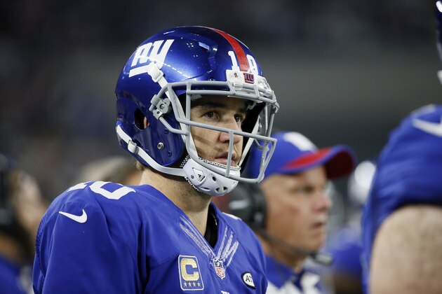 New York Giants quarterback Eli Manning (10) watches from the sideline during the second half of an NFL football game against the Dallas Cowboys, Sunday, Sept. 13, 2015, in Arlington, Texas. (AP Photo/Tony Gutierrez) New York Giants quarterback Eli Manning (10) watches from the sideline during the second half of an NFL football game against the Dallas Cowboys, Sunday, Sept. 13, 2015, in Arlington, Texas. (AP Photo/Tony Gutierrez)
