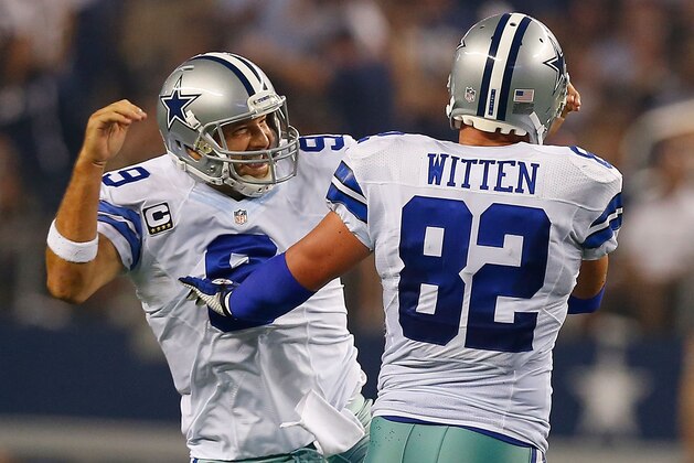 ARLINGTON, TX - SEPTEMBER 28:  Tony Romo #9 of the Dallas Cowboys and Jason Witten #82 of the Dallas Cowboys celebrate after scoring a touchdown against the New Orleans Saints in the first half at AT&T Stadium on September 28, 2014 in Arlington, Texas.  (Photo by Tom Pennington/Getty Images)