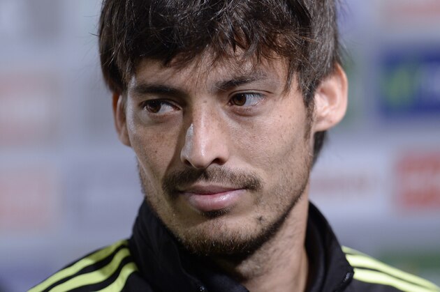 Spain's David Silva looks on after a press conference at the Atletico Paranaense training center in Curitiba, Brazil, Saturday, June 21, 2014. Spain will play in group B of the Brazil 2014 World Cup. (AP Photo/Manu Fernandez)