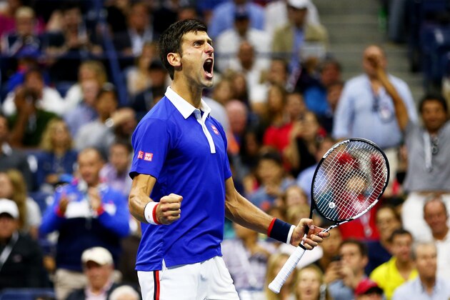 NEW YORK, NY - SEPTEMBER 13:  Novak Djokovic of Serbia celebrates winning a game in the fourth set against Roger Federer of Switzerland during their Men's Singles Final match on Day Fourteen of the 2015 US Open at the USTA Billie Jean King National Tennis Center on September 13, 2015 in the Flushing neighborhood of the Queens borough of New York City.  (Photo by Clive Brunskill/Getty Images)