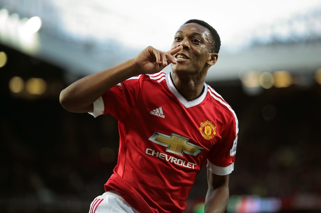 MANCHESTER, ENGLAND - SEPTEMBER 12:  Anthony Martial of Manchester United celebrates after scoring a goal to make it 3-1 on his debut  during the Barclays Premier League match between Manchester United and Liverpool on September 12, 2015 in Manchester, United Kingdom.  (Photo by Matthew Ashton - AMA/Getty Images)