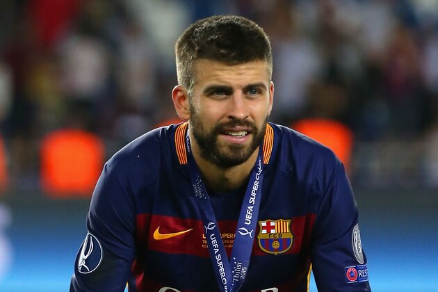 TBILISI, GEORGIA - AUGUST 11: Gerard Pique of Barcelona celebrates with the UEFA Super Cup after the UEFA Super Cup between Barcelona and Sevilla FC at Dinamo Arena on August 11, 2015 in Tbilisi, Georgia. (Photo by Chris Brunskill/Getty Images) TBILISI, GEORGIA - AUGUST 11: Gerard Pique of Barcelona celebrates with the UEFA Super Cup after the UEFA Super Cup between Barcelona and Sevilla FC at Dinamo Arena on August 11, 2015 in Tbilisi, Georgia. (Photo by Chris Brunskill/Getty Images)