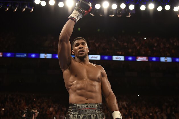 LONDON, ENGLAND - SEPTEMBER 12:  Anthony Joshua acknowledges the crowd after defeating Gary Cornish for the WBC International Heavyweight title & vacant Commonwealth Heavyweight title during 'Heavy Duty' fight night at The O2 Arena on September 12, 2015 in London, England.  (Photo by Leigh Dawney/Getty Images)