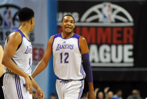 Jul 10, 2015; Las Vegas, NV, USA; Los Angeles Lakers center Robert Upshaw (12) reacts after a call during an NBA Summer League game against Minnesota at Thomas & Mack Center. Minnesota won the game 81-68.  Mandatory Credit: Stephen R. Sylvanie-USA TODAY Sports