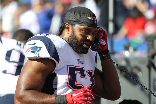 ORCHARD PARK, NY - OCTOBER 12: Jerod Mayo #51 of the New England Patriots talks on the phone against the Buffalo Bills during the first half at Ralph Wilson Stadium on October 12, 2014 in Orchard Park, New York. (Photo by Jerome Davis/Getty Images)