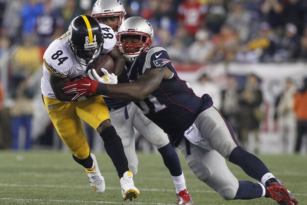 Sep 10, 2015; Foxborough, MA, USA; New England Patriots outside linebacker Jamie Collins (91) tackles Pittsburgh Steelers wide receiver Antonio Brown (84) during the third quarter at Gillette Stadium. Mandatory Credit: Stew Milne-USA TODAY Sports