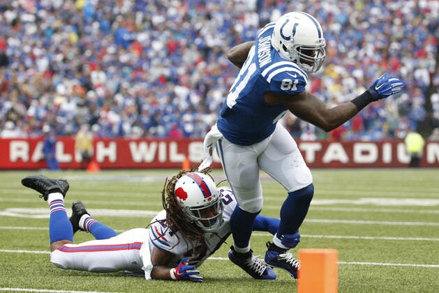 Indianapolis Colts wide receiver Andre Johnson (81) is tackled by Buffalo Bills cornerback Stephon Gilmore (24) during the second half of an NFL football game on Sunday, Sept. 13, 2015, in Orchard Park, N.Y. (AP Photo/Bill Wippert)