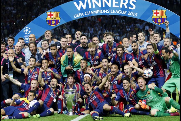 Team Barcelona celebrating the Champions League final victory. during the UEFA Champions League  final match between Barcelona and Juventus on June 6, 2015 at the Olympic stadium in Berlin, Germany.(Photo by VI Images via Getty Images)