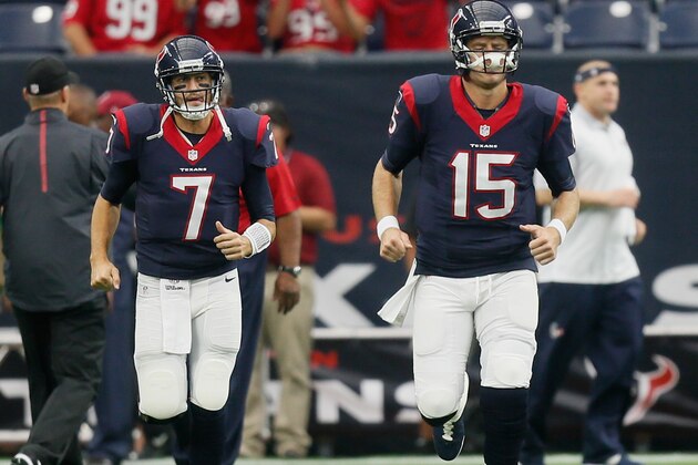 HOUSTON, TX - AUGUST 15:  Brian Hoyer #7 of the Houston Texans and Ryan Mallett #15 take the field during a preseason football game at NRG Stadium on August 15, 2015 in Houston, Texas. Houston won 23-10.  (Photo by Bob Levey/Getty Images)