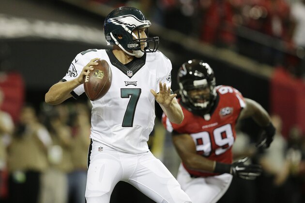 Philadelphia Eagles quarterback Sam Bradford (7) works against the Atlanta Falcons during the first half of an NFL football game, Monday, Sept. 14, 2015, in Atlanta. (AP Photo/Brynn Anderson)