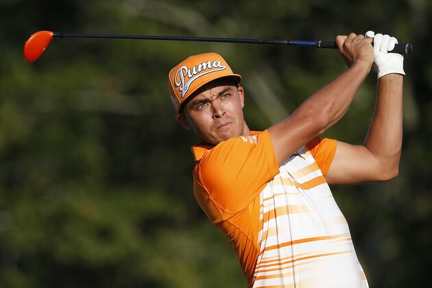 Rickie Fowler tees off on the 17th hole during the final round of the Deutsche Bank Championship golf tournament in Norton, Mass., Monday, Sept. 7, 2015. (AP Photo/Michael Dwyer)