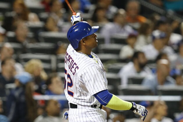 New York Mets Yoenis Cespedes hits a third-inning, solo home run in a baseball game against the Miami Marlins in New York, Monday, Sept. 14, 2015. (AP Photo/Kathy Willens)