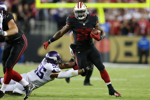 SANTA CLARA, CA - SEPTEMBER 14:  Carlos Hyde #28 of the San Francisco 49ers rushes past Anthony Barr #55 of the Minnesota Vikings during their NFL game at Levi's Stadium on September 14, 2015 in Santa Clara, California.  (Photo by Ezra Shaw/Getty Images)