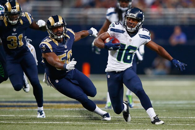 ST. LOUIS, MO - SEPTEMBER 13: Tyler Lockett #16 of the Seattle Seahawks returns a punt for a touchdown against the St. Louis Rams in the first quarter at the Edward Jones Dome on September 13, 2015 in St. Louis, Missouri. (Photo by Jamie Squire/Getty Images)
