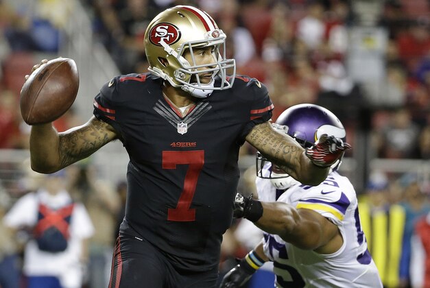San Francisco 49ers quarterback Colin Kaepernick (7) rolls out to pass as Minnesota Vikings outside linebacker Anthony Barr (55) applies pressure during the second half of an NFL football game in Santa Clara, Calif., Monday, Sept. 14, 2015. (AP Photo/Marcio Jose Sanchez)