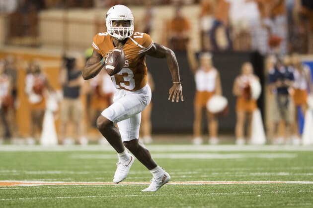 AUSTIN, TX - SEPTEMBER 12:  Jerrod Heard #13 of the Texas Longhorns scrambles against the Rice Owls during the third quarter on September 12, 2015 at Darrell K Royal-Texas Memorial Stadium in Austin, Texas.  (Photo by Cooper Neill/Getty Images)