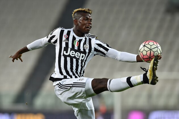 TURIN, ITALY - SEPTEMBER 12:  Paul Pogba of Juventus FC controls the ball during the Serie A match between Juventus FC and AC Chievo Verona at Juventus Arena on September 12, 2015 in Turin, Italy.  (Photo by Valerio Pennicino/Getty Images)