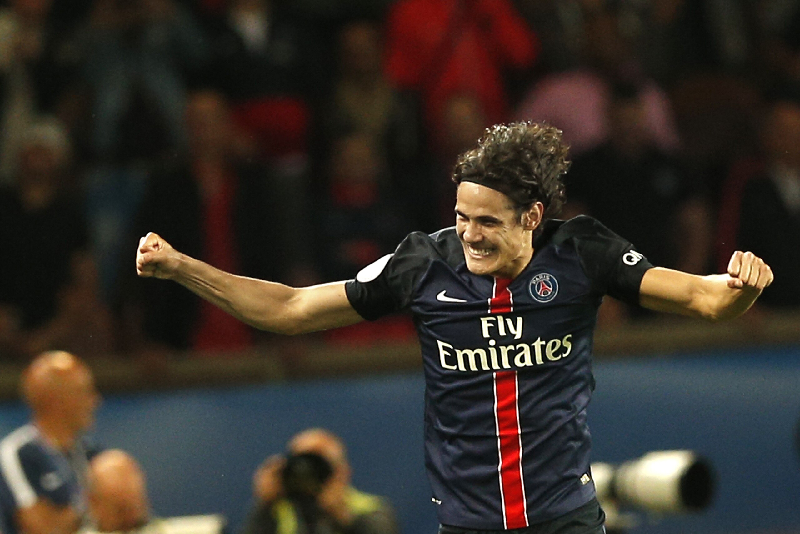 PSG's Edinson Cavani, celebrates his goal during the French league one soccer match between Paris Saint Germain and Bordeaux, in Paris, France, Friday, Sept. 11, 2015. (AP Photo/Christophe Ena) PSG's Edinson Cavani, celebrates his goal during the French league one soccer match between Paris Saint Germain and Bordeaux, in Paris, France, Friday, Sept. 11, 2015. (AP Photo/Christophe Ena)