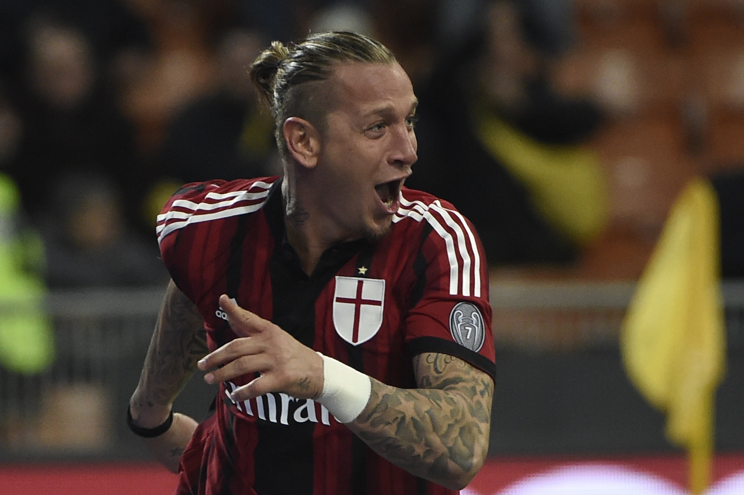 AC Milan's defender from France Philippe Mexes celebrates after scoring during the Italian Serie A football match AC Milan vs Hellas Verona on March 7, 2015 at the San Siro Stadium stadium in Milan. AFP PHOTO / OLIVIER MORIN        (Photo credit should read OLIVIER MORIN/AFP/Getty Images)