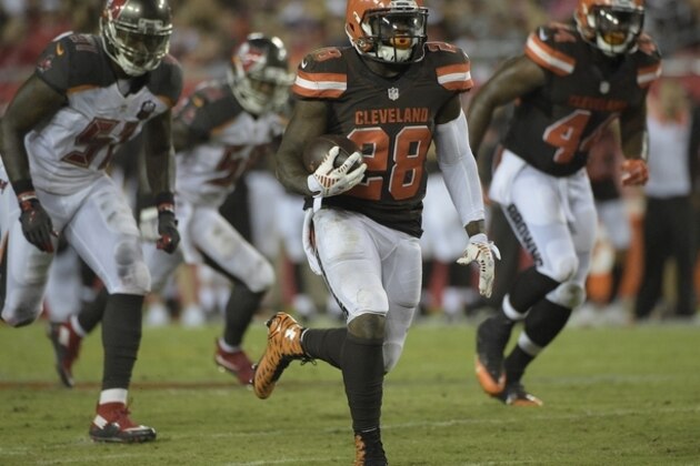 Cleveland Browns running back Terrance West (28) runs against the Tampa Bay Buccaneers during the third quarter of an NFL preseason football game Saturday, Aug. 29, 2015, in Tampa, Fla. (AP Photo/Phelan M. Ebenhack)