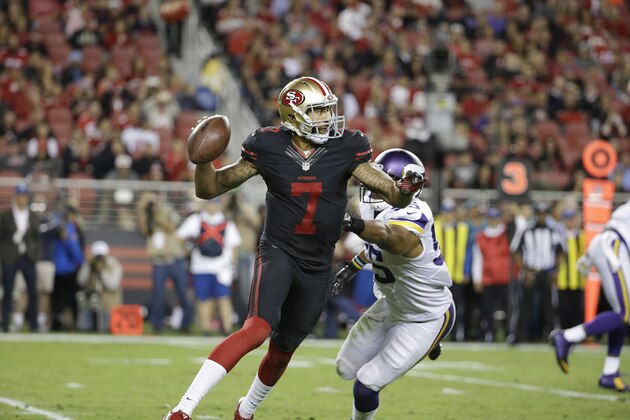San Francisco 49ers quarterback Colin Kaepernick (7) passes as he is pressured by Minnesota Vikings outside linebacker Anthony Barr (55) during the second half of an NFL football game in Santa Clara, Calif., Monday, Sept. 14, 2015. (AP Photo/Marcio Jose Sanchez)