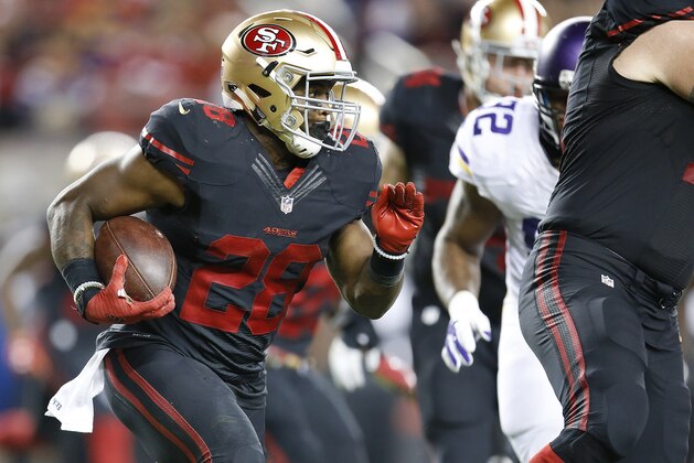 San Francisco 49ers running back Carlos Hyde (28) runs against the Minnesota Vikings during the first half of an NFL football game in Santa Clara, Calif., Monday, Sept. 14, 2015. (AP Photo/Tony Avelar)