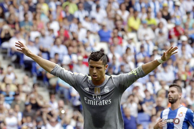 Real Madrid's Cristiano Ronaldo celebrates after scoring against Espanyol during a Spanish La Liga soccer match  at Cornella-El Prat stadium in Cornella Llobregat, Spain, Saturday, Sept. 12, 2015. (AP Photo/Manu Fernandez)