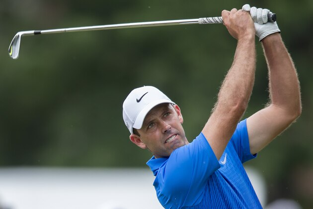 Paul Casey tees off on the third hole during the final round of the Wyndham Championship golf tournament at Sedgefield Country Club in Greensboro, N.C., Sunday, Aug. 23, 2015. (AP Photo/Rob Brown)