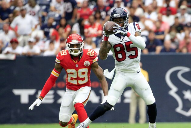 Sep 13, 2015; Houston, TX, USA; Houston Texans wide receiver Nate Washington (85) makes a catch as Kansas City Chiefs strong safety Eric Berry (29) defends during the first half at NRG Stadium. Mandatory Credit: Kevin Jairaj-USA TODAY Sports