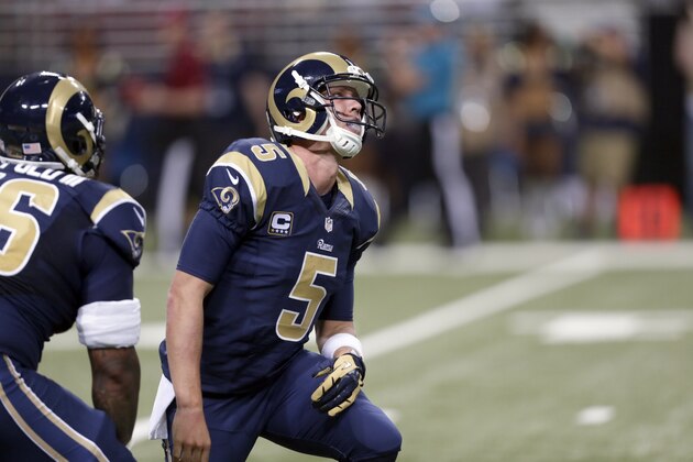 St. Louis Rams quarterback Nick Foles gets up after fumbling a ball resulting in a Seattle Seahawks touchdown during the fourth quarter of an NFL football game Sunday, Sept. 13, 2015, in St. Louis. (AP Photo/Tom Gannam)