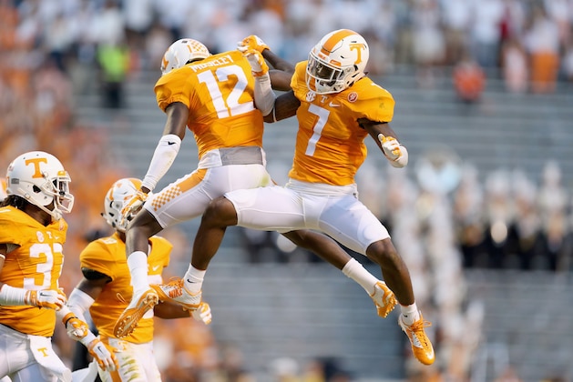 KNOXVILLE, TN - SEPTEMBER 12: Cameron Sutton #7 and  Emmanuel Moseley #12 of the Tennessee Volunteers celebrate after Moseley broke up a pass against the Oklahoma Sooners during the game at Neyland Stadium on September 12, 2015 in Knoxville, Tennessee.  (Photo by Andy Lyons/Getty Images)