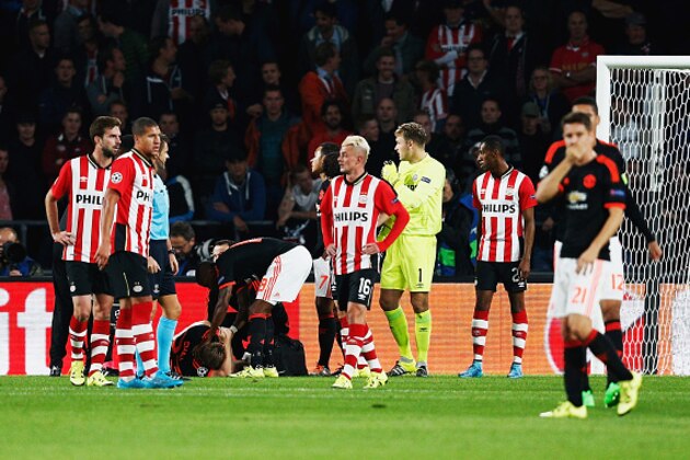 EINDHOVEN, NETHERLANDS - SEPTEMBER 15:  Luke Shaw of Manchester United lies on the ground injured during the UEFA Champions League Group B match between PSV Eindhoven and Manchester United at PSV Stadion on September 15, 2015 in Eindhoven, Netherlands.  (Photo by Dean Mouhtaropoulos/Getty Images)