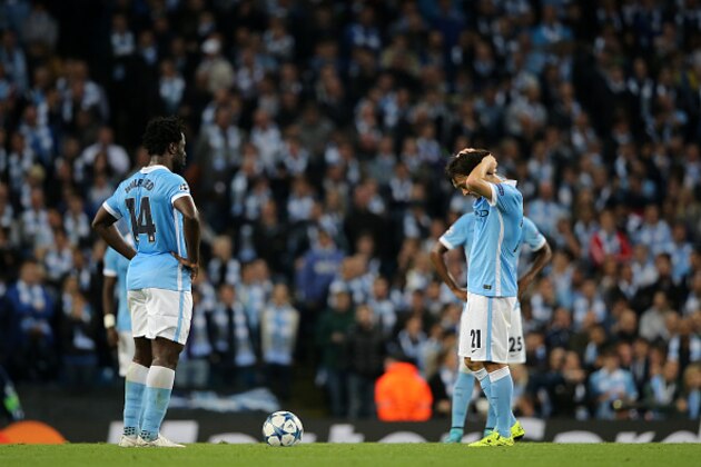 MANCHESTER, ENGLAND - SEPTEMBER 15:  A dejected Wilfried Bony and David Silva of Manchester City during the UEFA Champions League Group D match between Manchester City FC and Juventus at the Etihad Stadium on September 15, 2015 in Manchester, United Kingdom.  (Photo by Matthew Ashton - AMA/Getty Images)