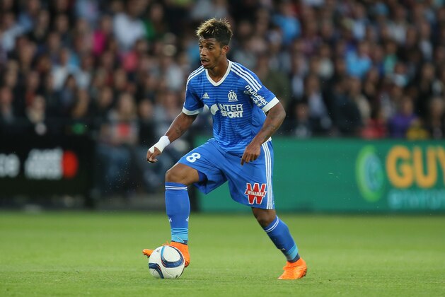 Marseille's midfielder Mario Lemina of Gabon controls the ball on the field during his French League One soccer match against Guingamp at the Roudourou stadium in Guingamp, western France, Friday, Aug. 28, 2015. (AP Photo/David Vincent)