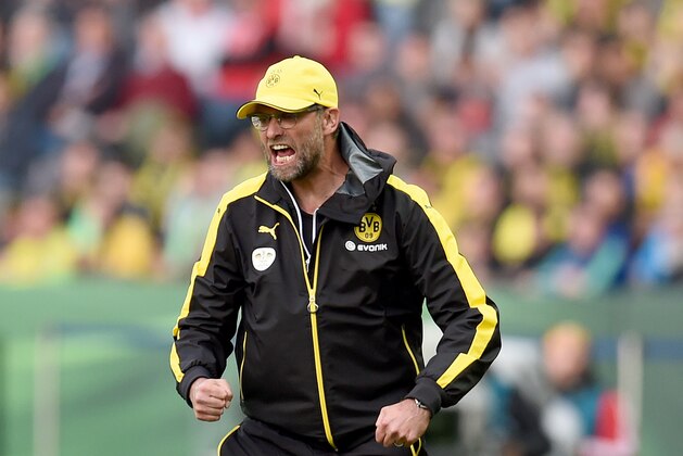 Dortmund's head coach Juergen Klopp reacts during the German Cup DFB Pokal final football match between BVB Borussia Dortmund and VfL Wolfsburg at the Olympic Stadium in Berlin on May 30, 2015. AFP PHOTO / PATRIK STOLLARZ (Photo credit should read PATRIK STOLLARZ/AFP/Getty Images) Dortmund's head coach Juergen Klopp reacts during the German Cup DFB Pokal final football match between BVB Borussia Dortmund and VfL Wolfsburg at the Olympic Stadium in Berlin on May 30, 2015. AFP PHOTO / PATRIK STOLLARZ (Photo credit should read PATRIK STOLLARZ/AFP/Getty Images)