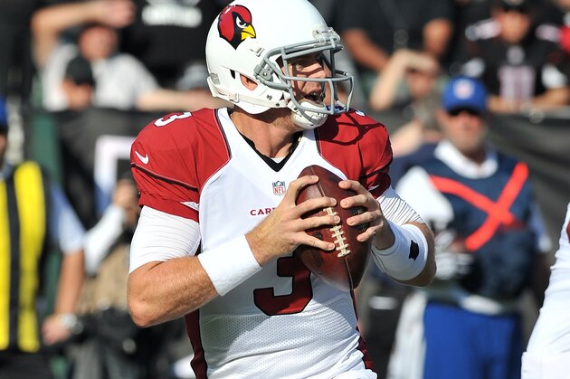 Arizona Cardinals quarterback (3) Carson Palmer back to pass during a preseason football game against the Oakland Raiders played at O.co Coliseum in Oakland on Sunday, Aug. 30, 2015. (AP Photo/John Cordes)
