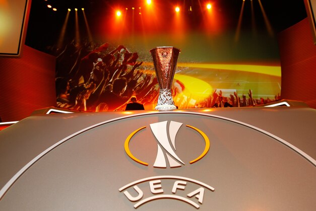 The Europa League trophy is displayed, during the Europa League draw ceremony of the first round of the 2015/2016 Europa League, at the Grimaldi Forum, in Monaco, Friday, Aug. 28, 2015. (AP Photo/Claude Paris)