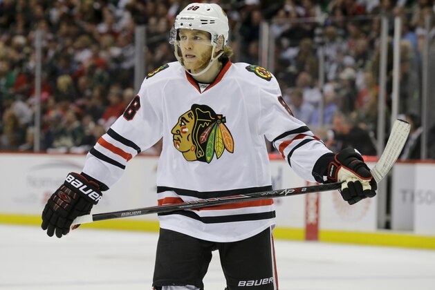 Chicago Blackhawks right wing Patrick Kane (88) gets into position for a face-off against the Minnesota Wild during the second period of Game 3 in the second round of the NHL Stanley Cup hockey playoffs in St. Paul, Minn., Tuesday, May 5, 2015. (AP Photo/Ann Heisenfelt)