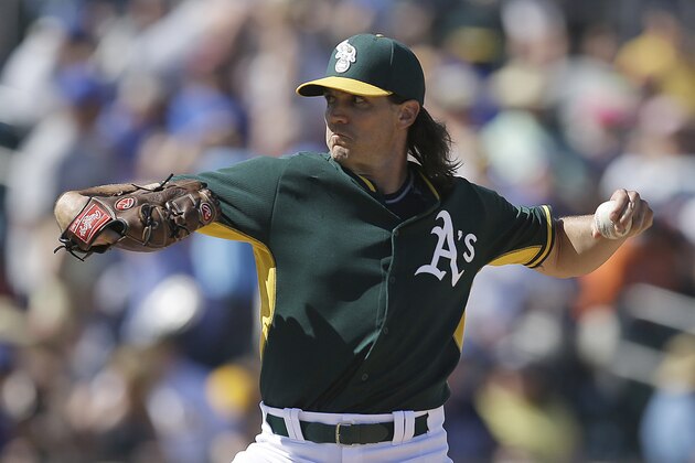 Oakland Athletics' Barry Zito works against the Chicago Cubs in the fourth inning of a spring training exhibition baseball game Tuesday, March 24, 2015, in Mesa, Ariz. (AP Photo/Ben Margot)