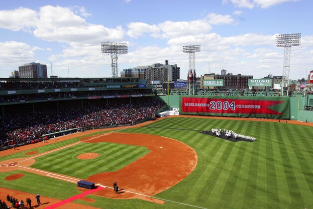 The Boston Red Sox prepare to get their World Series rings before the start of the game against the New York Yankees  Monday, April 11, 2005 in Boston. (AP Photo/Chitose Suzuki)