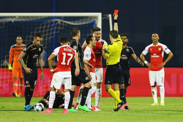 ZAGREB, CROATIA - SEPTEMBER 16: Olivier Giroud of Arsenal is shown the red card by referee Ovidiu Hategan during the UEFA Champions League Group F match between Dinamo Zagreb and Arsenal at Maksimir Stadium on September 16, 2015 in Zagreb, Croatia.  (Photo by Alexander Hassenstein/Getty Images)