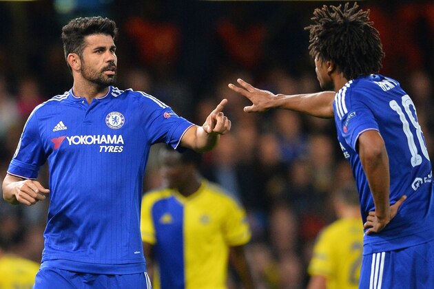 Chelsea's Brazilian-born Spanish striker Diego Costa (L) and Chelsea's French striker Loic Remy excahnge words during the UEFA Champions League, group G, football match between Chelsea and Maccabi Tel Aviv at Stamford Bridge in London on September 16, 2015.    AFP PHOTO / GLYN KIRK        (Photo credit should read GLYN KIRK/AFP/Getty Images)