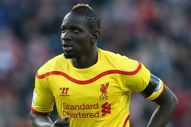 Liverpool's French defender Mamadou Sakho wears a black armband as he plays during the English Premier League football match between Sunderland and Liverpool at The Stadium of Light in Sunderland, north east England on January 10, 2015. AFP PHOTO / IAN MACNICOL

RESTRICTED TO EDITORIAL USE. No use with unauthorized audio, video, data, fixture lists, club/league logos or live services. Online in-match use limited to 45 images, no video emulation. No use in betting, games or single club/league/player publications.        (Photo credit should read Ian MacNicol/AFP/Getty Images)