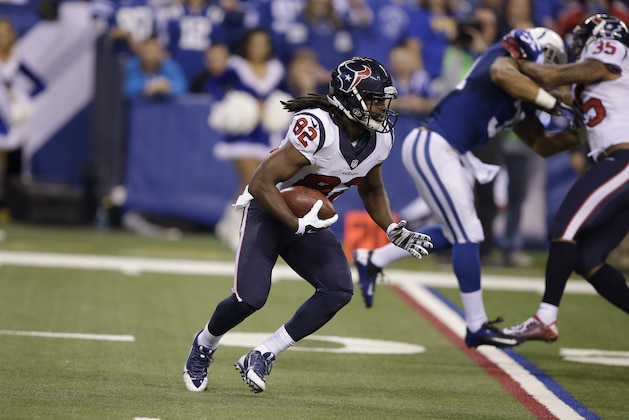 Houston Texans wide receiver Keshawn Martin runs after a catch against the Indianapolis Colts during the second half of an NFL football game in Indianapolis, Sunday, Dec. 14, 2014. (AP Photo/Darron Cummings)