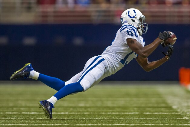 Indianapolis Colts wide receiver T.Y. Hilton (13) dives for a pass during an NFL game against the St. Louis Rams on Saturday Aug. 29, 2015 at the Edward Jones Dome in St. Louis. (AP Photo/TUSP, Jay Biggerstaff)