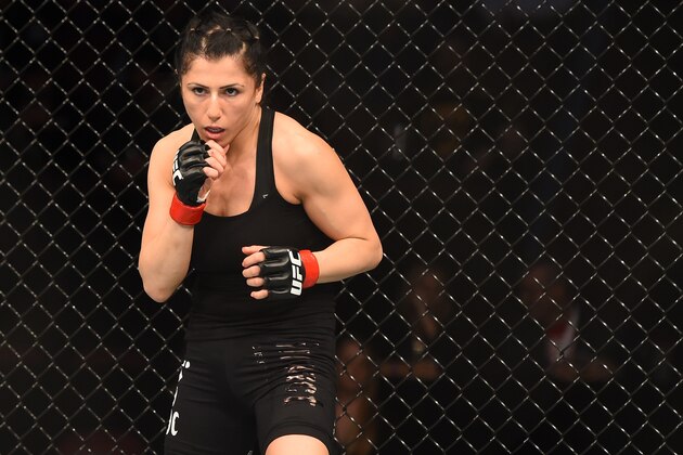 MONTREAL, QC - APRIL 25:   Randa Markos of Canada stands in the Octagon before her women's strawweight bout against Aisling Daly of Ireland during the UFC 186 event at the Bell Centre on April 25, 2015 in Montreal, Quebec, Canada. (Photo by Josh Hedges/Zuffa LLC/Zuffa LLC via Getty Images)