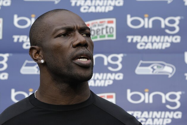 Seattle Seahawks' Terrell Owens is shown taking questions from reporters during NFL football training camp, Wednesday, Aug. 8, 2012, in Renton, Wash. (AP Photo/Ted S. Warren)