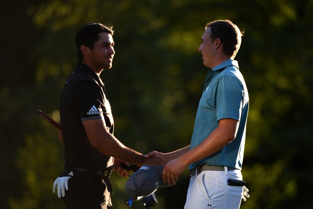 NORTON, MA - SEPTEMBER 05:  Jason Day of Australia and Jordan Spieth shake hand on the 18th green during round two of the Deutsche Bank Championship at TPC Boston on September 5, 2015 in Norton, Massachuetts.  (Photo by Ross Kinnaird/Getty Images)